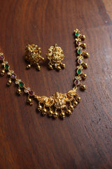 Lakshmi Oval Ruby Green Close Neck Set